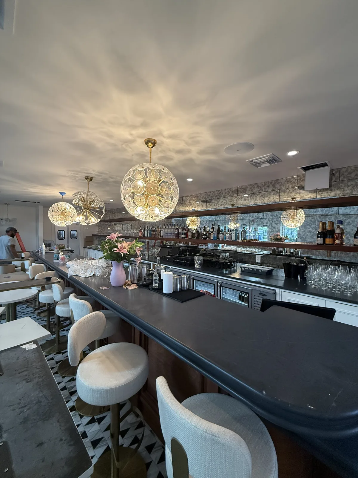 Bar seating with upholstered stools and stone countertop